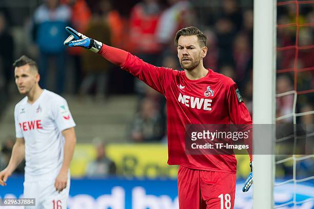 Goalkeeper Thomas Kessler of Cologne gestures during the Bundesliga match between 1. FC Cologne and Borussia Dortmund at the RheinEnergie stadium in...