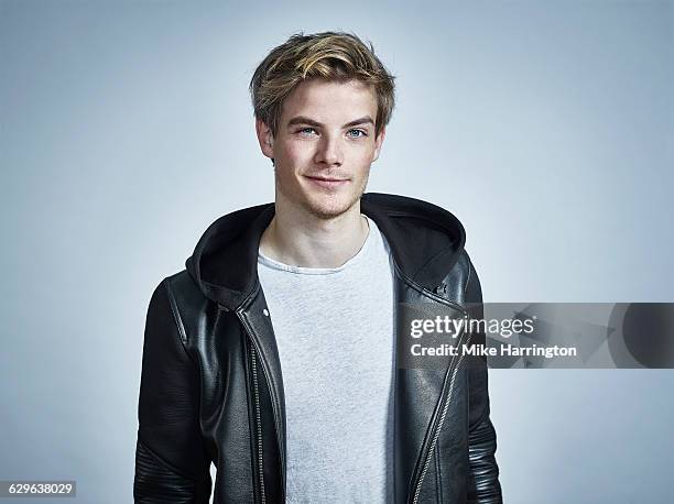 portrait of young, blonde male - young man blue eyes stock pictures, royalty-free photos & images