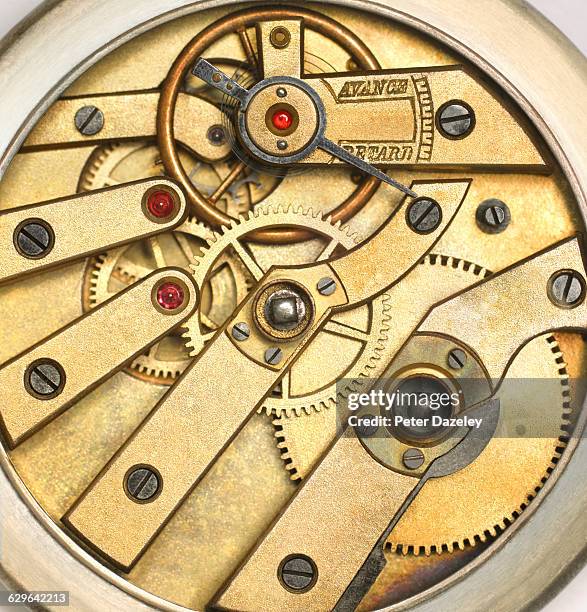 internal mechanism of edwardian pocket watch - antique watch stock pictures, royalty-free photos & images