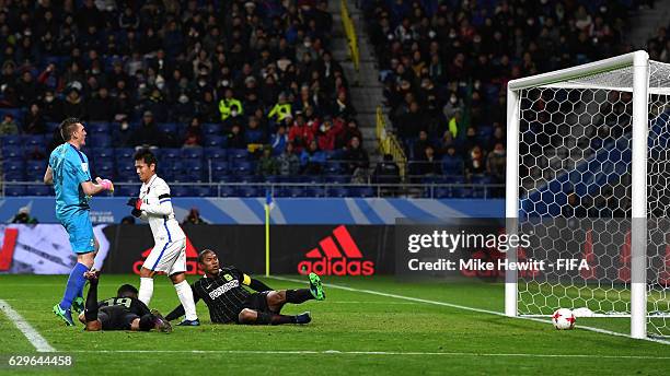 Yasushi Endo of Kashima Antlers scores his sides second goal during the FIFA Club World Cup Semi Final match between Atletico Nacional and Kashima...