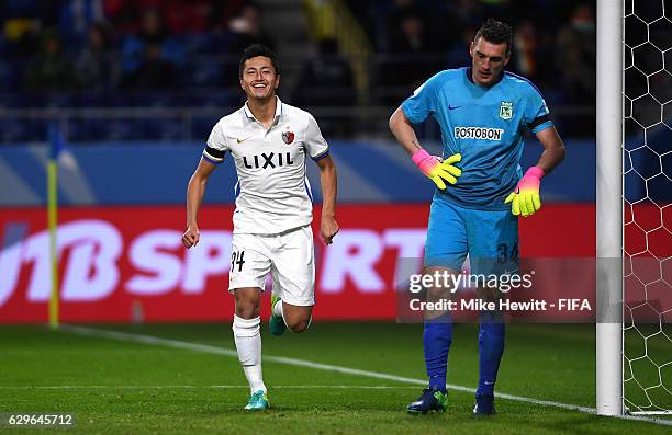 Yuma Suzuki of Kashima Antlers celebrates after scoring his sides third goal during the FIFA Club World Cup Semi Final match between Atletico...