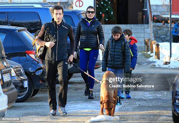 Alena Seredova with sons David Lee Buffon, Luis Thomas Buffon and Alessandro Nasi are seen on December 10, 2016 in Courmayeur, Italy.