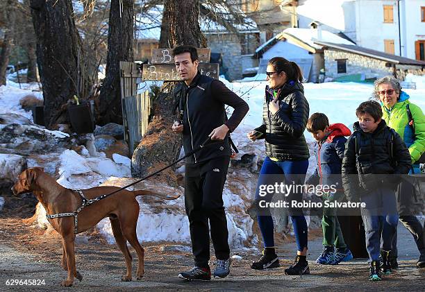 Alena Seredova with sons David Lee Buffon, Luis Thomas Buffon and Alessandro Nasi are seen on December 10, 2016 in Courmayeur, Italy.