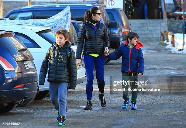 Alena Seredova with sons David Lee Buffon, Luis Thomas Buffon and Alessandro Nasi are seen on December 10, 2016 in Courmayeur, Italy.