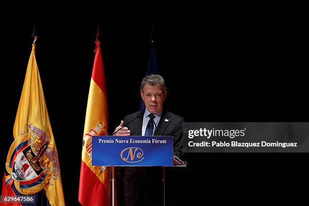 President of Colombia Juan Manuel Santos speaks at the Premio Nueva Economia Forum 2016 ceremony at the Royal Theatre on December 14, 2016 in Madrid,...