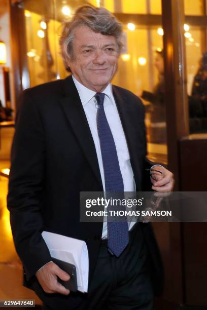 Former French minister Jean-Louis Borloo arrives at the Paris' courthouse on December 14 prior to a hearing of IMF chief Christine Lagarde before the...