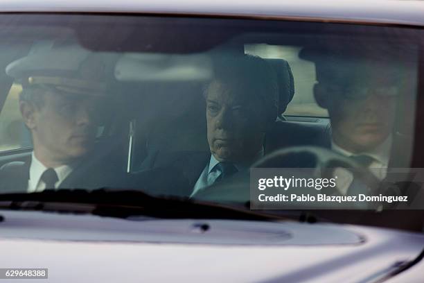 President of Colombia Juan Manuel Santos sits in a car as he arrives at the Premio Nueva Economia Forum 2016 ceremony at the Royal Theatre on...