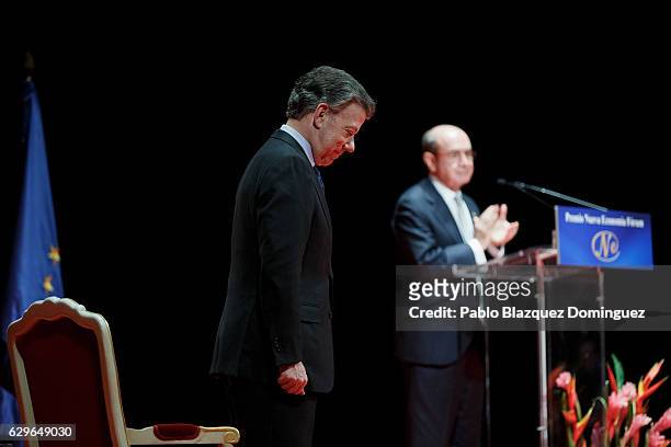 President of Colombia Juan Manuel Santos gestures as spectators applaud him during the Premio Nueva Economia Forum 2016 ceremony at the Royal Theatre...