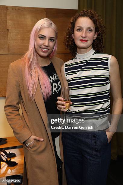 Amber Le Bon and Rowan Routh attend the Rupert Sanderson festive Christmas Lunch at Bruton Place on December 14, 2016 in London, England.