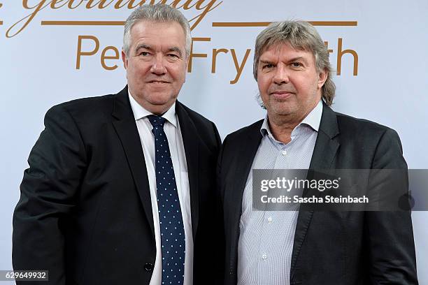 Vice president Peter Frymuth poses with Ronny Zimmermann during his 60th birthday matinee on December 14, 2016 in Duesseldorf, Germany.