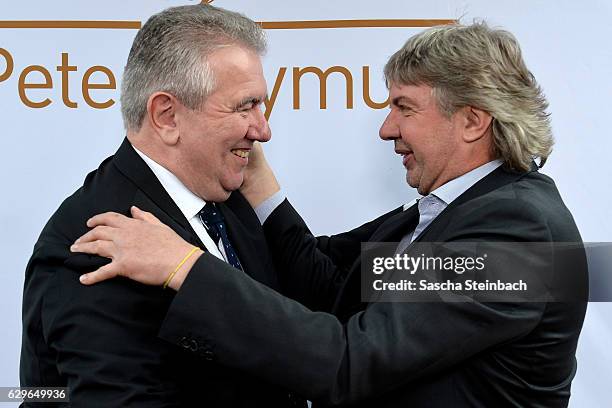 Vice president Peter Frymuth welcomes Ronny Zimmermann during his 60th birthday matinee on December 14, 2016 in Duesseldorf, Germany.