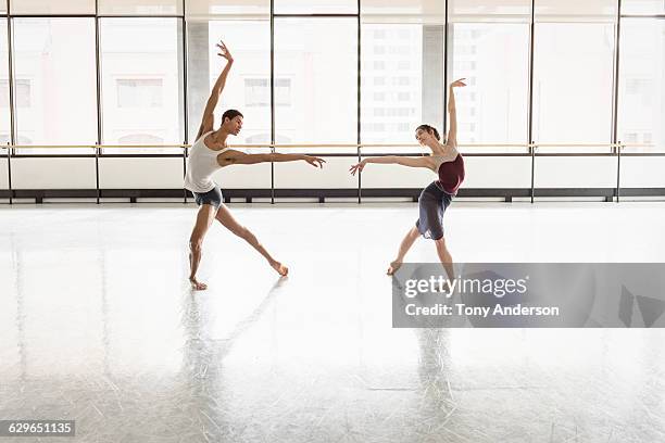 ballet dancers in rehearsal studio - women in slips stock-fotos und bilder