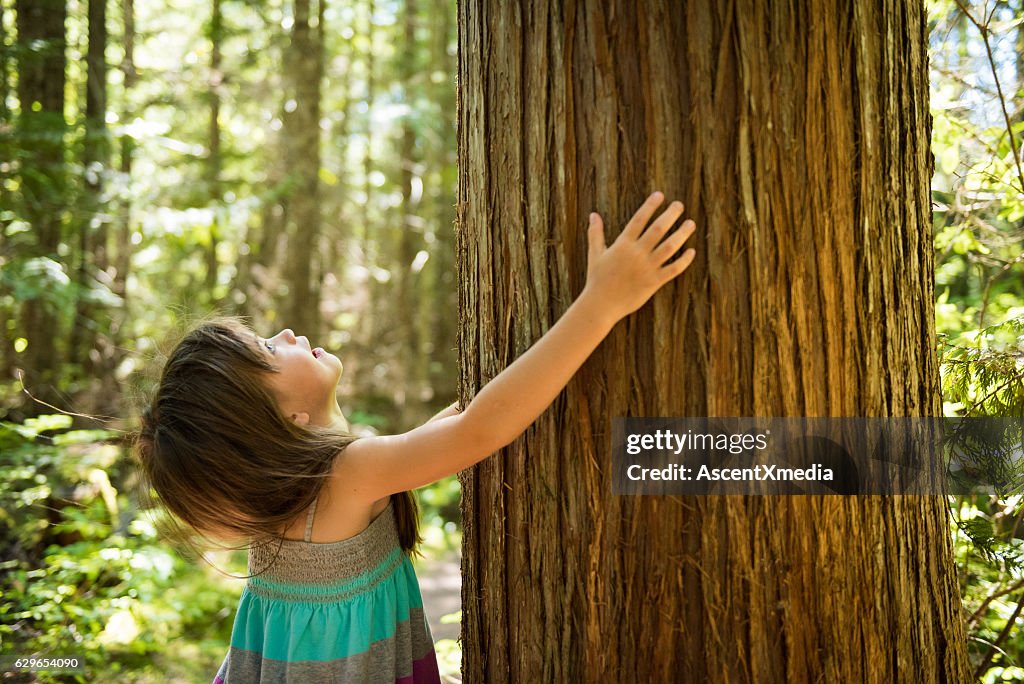 Young girl connecting with nature