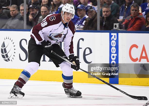 Patrick Wiercioch of the Colorado Avalanche looks to pass while playing against the Toronto Maple Leafs during the second period at the Air Canada...