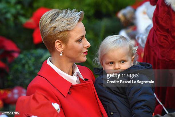 Prince Jacques of Monaco and mother Princess Charlene Of Monaco attend the annual Christmas gifts distribution at Monaco Palace on December 14, 2016...