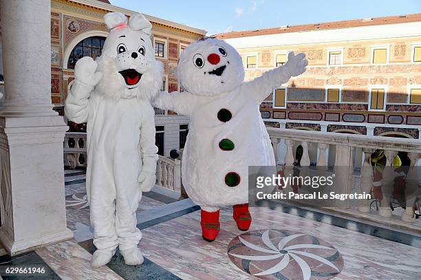 Bunny and a snowman mascot are seen at the annual Christmas gifts distribution at Monaco Palace on December 14, 2016 in Monaco, Monaco.