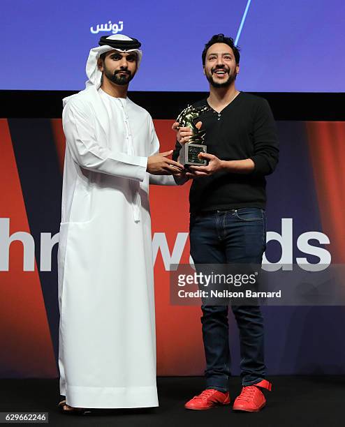 Sheikh Mansoor bin Mohammed bin Rashid Al Maktoum presents Mehdi M. Barsaoui with the Muhr Shorts Best Film award for "Khallina Hakka Khir " during...