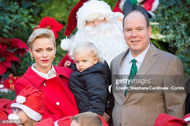 Princess Charlene of Monaco, Prince Jacques of Monaco and Prince Albert II of Monaco attend the Christmas gifts distribution at Monaco Palace on...