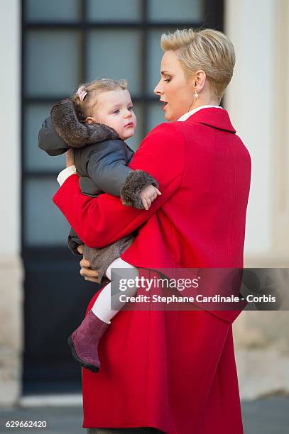 Princess Charlene of Monaco and Princess Gabriella of Monaco attend the Christmas gifts distribution at Monaco Palace on December 14, 2016 in Monaco,...