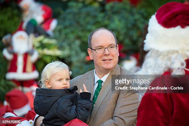 Prince Jacques of Monaco and Prince Albert II of Monaco attend the Christmas Gifts Distribution At Monaco Palace on December 14, 2016 in Monaco,...