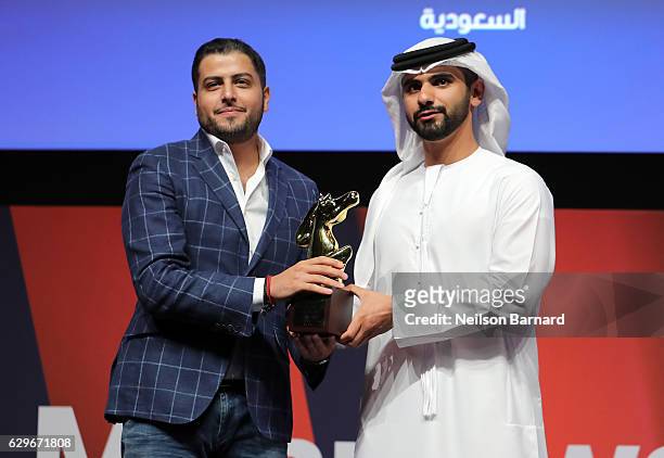 Sheikh Mansoor bin Mohammed bin Rashid Al Maktoum presents Bader Alhomoud with the Muhr Shorts Best Film award for "Fadhilat an Takona La Ahad "...