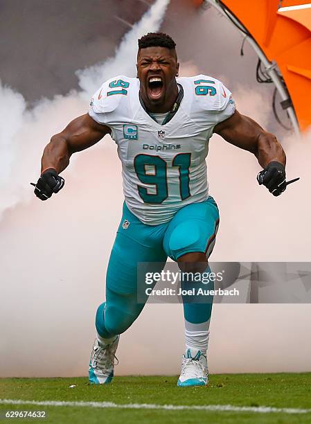 Cameron Wake of the Miami Dolphins is introduced prior to the game against the Arizona Cardinals on December 11, 2016 at Hard Rock Stadium in Miami...