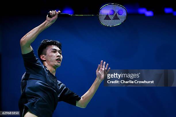 Ka Long Angus of Honk Kong in action during his mens singles match against Viktor Axelsen of Denmark on Day One of the BWF Dubai World Superseries...