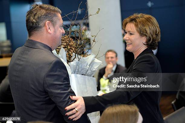 Sabrina Frymuth is given a present during his 60th birthday matinee on December 14, 2016 in Duesseldorf, Germany.