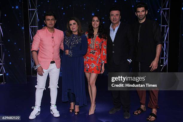 Bollywood singer Sonu Nigam, director Farah Khan, actor Shraddha Kapoor, singer Anu Malik and actor Aditya Roy Kapur on the set of Indian Idol Season...