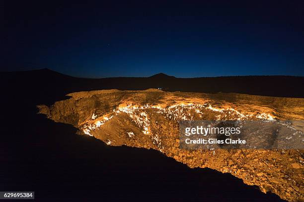 The "Door to Hell" is a natural gas field in Derweze, Turkmenistan, that collapsed into an underground cavern in 1971, becoming a natural gas crater....