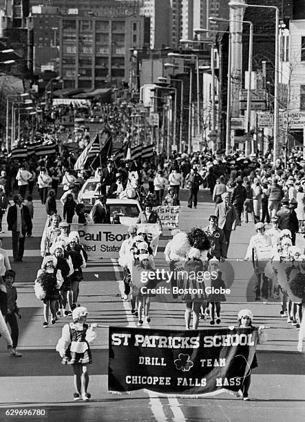 The drill team from St. Patrick's School of Chicopee, Massl, makes its way up West Broadway during the St. Patrick's Day parade in Boston on March...