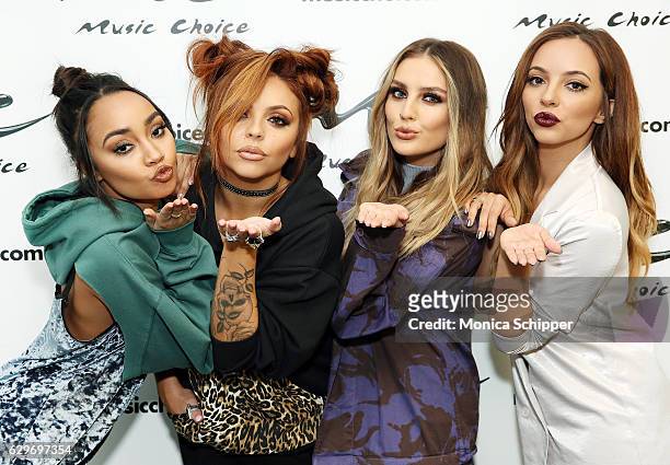 Leigh-Anne Pinnock, Jesy Nelson, Perrie Edwards and Jade Thirlwall of Little Mix visit Music Choice at Music Choice on December 14, 2016 in New York...