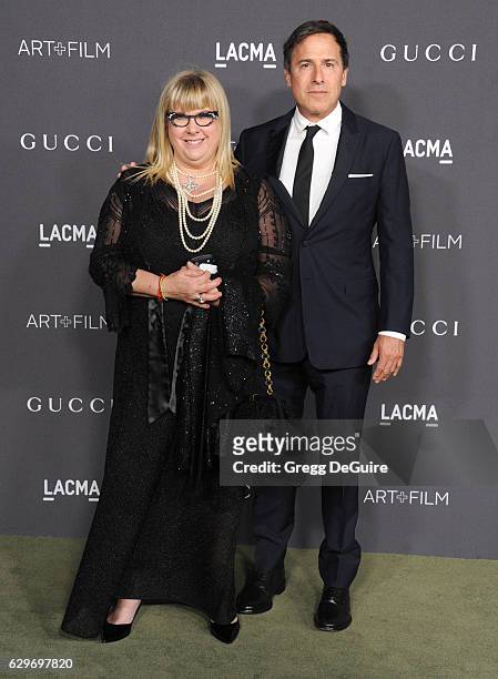 Writer/director David O. Russell and guest arrive at the 2016 LACMA Art + Film Gala Honoring Robert Irwin And Kathryn Bigelow Presented By Gucci at...