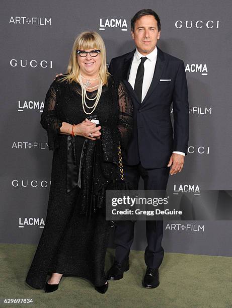 Writer/director David O. Russell and guest arrive at the 2016 LACMA Art + Film Gala Honoring Robert Irwin And Kathryn Bigelow Presented By Gucci at...