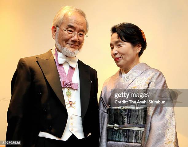 Nobel Prize in Physiology or Medicine laureate Yoshinori Ohsumi and his wife Mariko prepare to attend the Nobel Prize Awards Ceremony at their hotel...