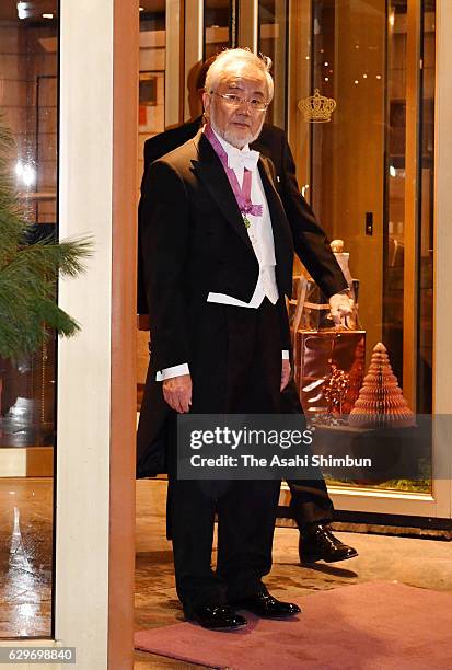 Nobel Prize in Physiology or Medicine laureate Yoshinori Ohsumi leaves his hotel to attend the Nobel Prize Awards Ceremony on December 10, 2016 in...