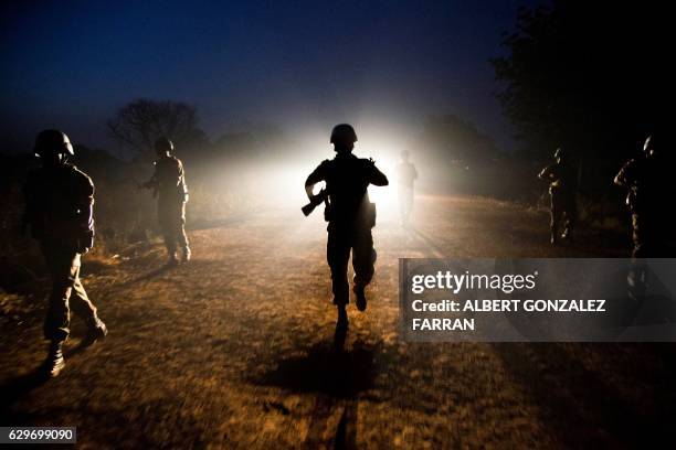 Peacekeeper troops from Ethiopia and deployed in the United Nations Interim Security Force for Abyei patrol at night in Abyei town, Abyei state, on...