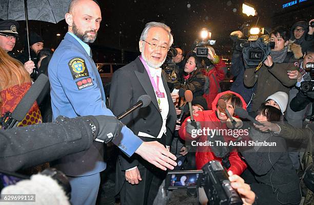 Nobel Prize in Physiology or Medicine laureate Yoshinori Ohsumi is seen on arrival at his hotel after the Nobel Prize Banquet on December 10, 2016 in...