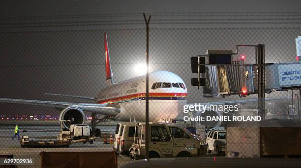 An airplane of Meridiana airline, chartered to deport refugees back to Afghanistan prepares to take off at the airport in Frankfurt am Main, western...