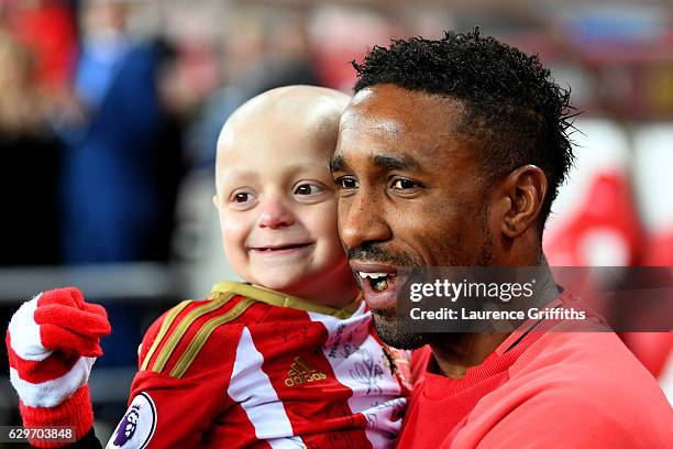 Bradley Lowrey and Jermain Defoe of Sunderland have a photograph together pre match during the Premier League match between Sunderland and Chelsea at...