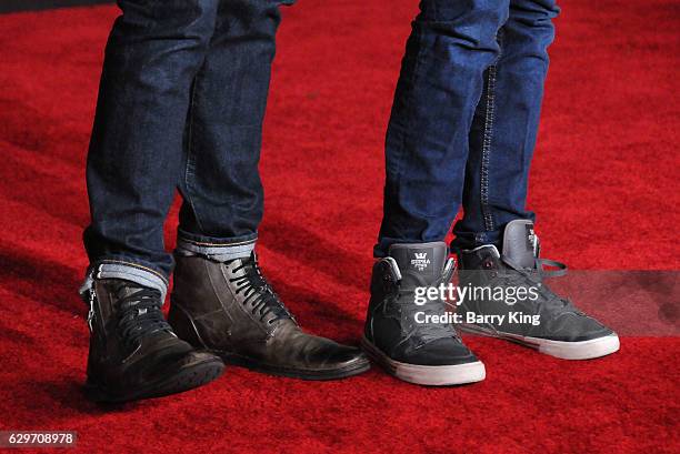 Personality Cameron Mathison and son Lucas Arthur Mathison, shoe detail, attend the premiere of Walt Disney Pictures and Lucasfilms' 'Rogue One: A...