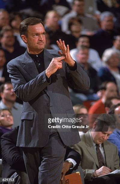 Head Coach Lon Kruger of the Seattle SuperSonics signals from the sidelines during the game against the Atlanta Hawks at Key Arena in Seattle,...