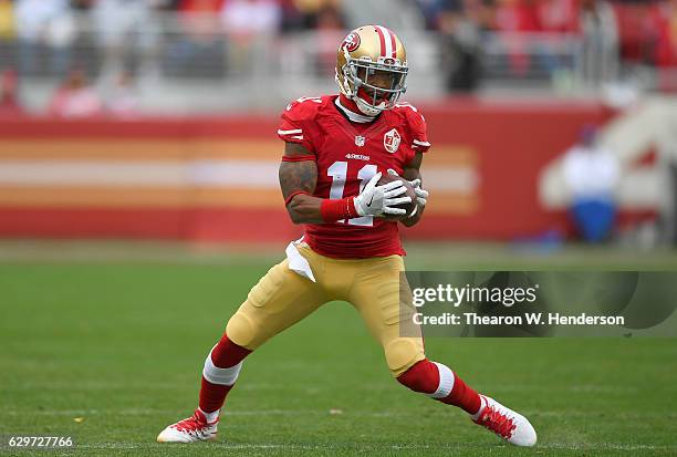 Quinton Patton of the San Francisco 49ers runs with the ball after catching a pass against the New York Jets during the first quarter of their NFL:...