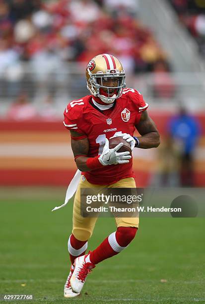 Quinton Patton of the San Francisco 49ers runs with the ball after catching a pass against the New York Jets during the first quarter of their NFL:...