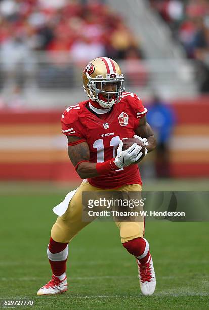 Quinton Patton of the San Francisco 49ers runs with the ball after catching a pass against the New York Jets during the first quarter of their NFL:...
