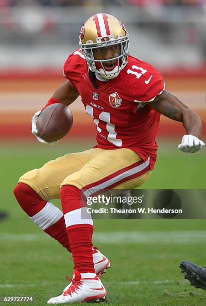 Quinton Patton of the San Francisco 49ers runs with the ball after catching a pass against the New York Jets during the first quarter of their NFL:...