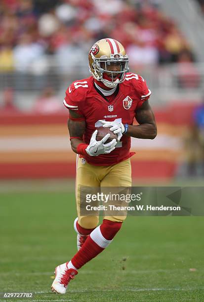 Quinton Patton of the San Francisco 49ers runs with the ball after catching a pass against the New York Jets during the first quarter of their NFL:...