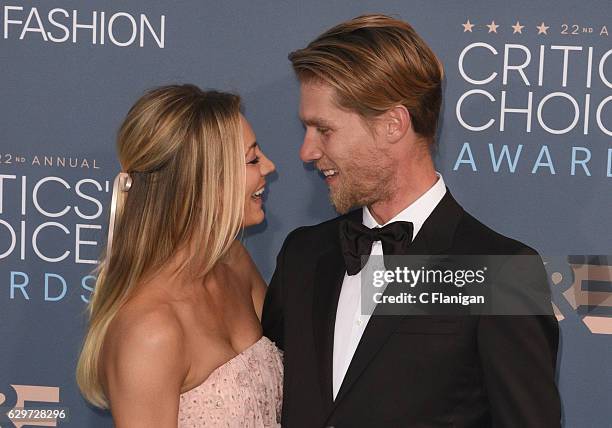 Kaley Cuoco and Karl Cook arrive at the The 22nd Annual Critics' Choice Awards at Barker Hangar on December 11, 2016 in Santa Monica, California.