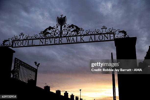 General view of You'll Never Walk Alone signage outside Anfield, the home stadium of Liverpool at dusk during the Premier League match between...