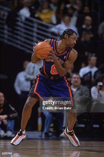 Latrell Sprewell of the New York Knicks moves with the ball during the game against the Denver Nuggets at the Pepsi Center in Denver, Colorado. The...